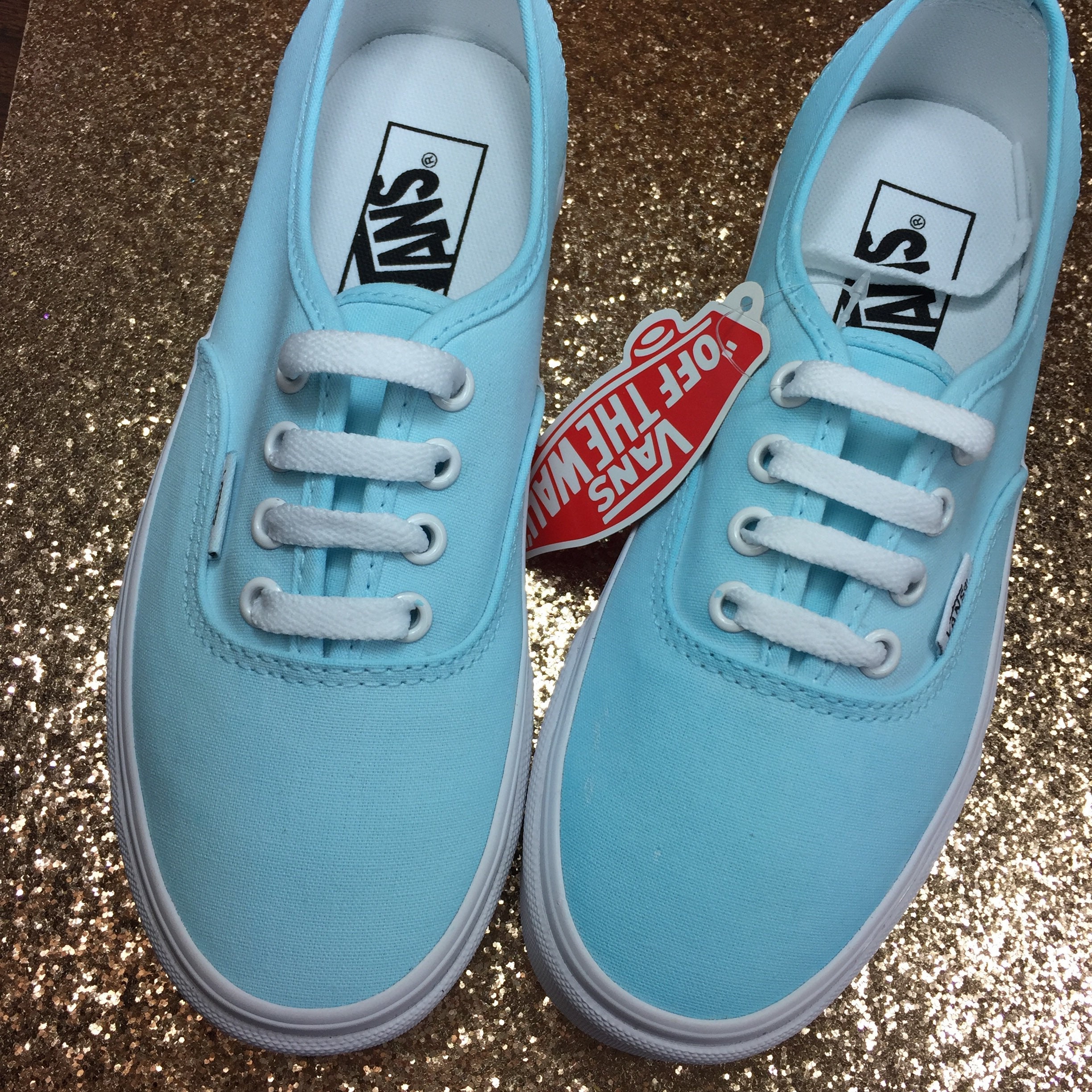 light blue and dark blue vans shoes