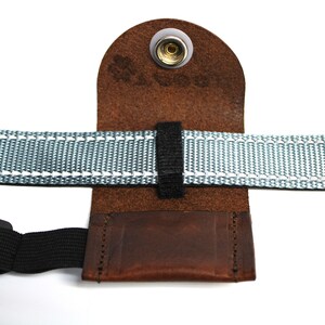 Pet tag silencer custom leather pouch for dog collars and Martindale collars. This is a hand dyed and hand stamped product, handcrafted with 3oz. vegetable-tanned leather.