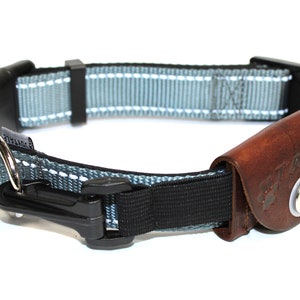 Pet tag silencer custom leather pouch for dog collars and Martindale collars. This is a hand dyed and hand stamped product, handcrafted with 3oz. vegetable-tanned leather.