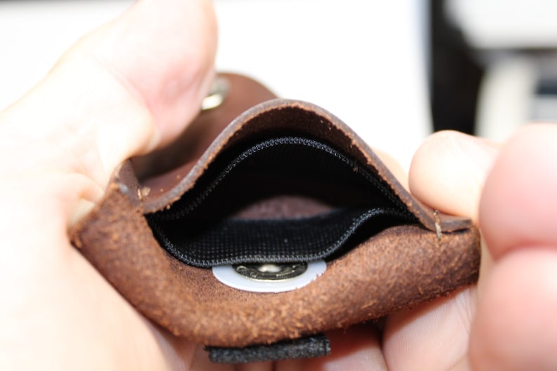 Pet tag silencer custom leather pouch for dog collars and Martindale collars. This is a hand dyed and hand stamped product, handcrafted with 3oz. vegetable-tanned leather.