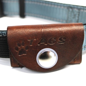 Pet tag silencer custom leather pouch for dog collars and Martindale collars. This is a hand dyed and hand stamped product, handcrafted with 3oz. vegetable-tanned leather.