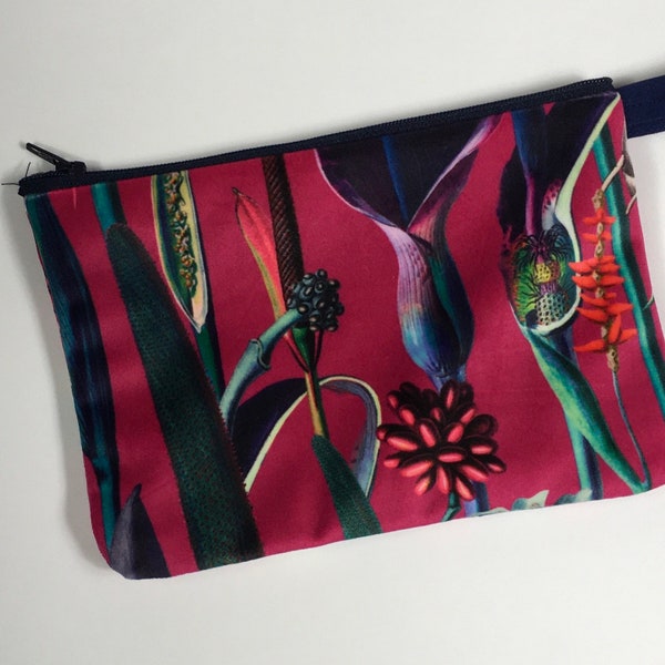 Velvet new tropical plants  Coin purse or make-up bag on  pink background.