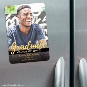 May include: A black and gold graduation magnet with a photo of a smiling young man. The magnet says "Graduate Class of 2020" and includes the graduate's name, graduation date, and high school.