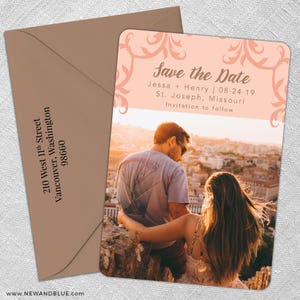 May include: Save the Date card with a peach background and a floral design. The card features a couple looking out over a city skyline at sunset. The text reads "Save the Date" with the names Jessa and Henry, the date 08-24-19, the location St. Joseph, Missouri, and the phrase "Invitation to follow".