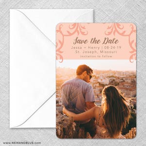 May include: Save the Date card with a peach background and a couple in front of a city skyline. The text reads "Save the Date", "Jessa + Henry | 08-24-19", "St. Joseph, Missouri", and "Invitation to follow".