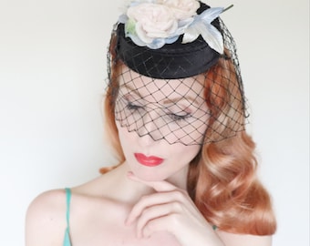 Vintage 1950s Hat / 50s pillbox hat / Black satin / Pink and blue roses / Birdcage veil / Pretty