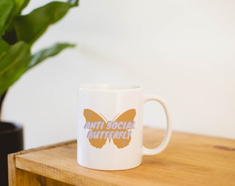 Antisociale vlindermok: keramische koffiebeker van 325 ml, 440 ml of 590 ml.