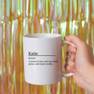 11oz white mug with a customizable definition design in black. Add a name and the definition for that person.