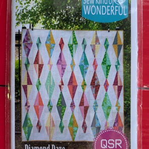May include: A quilt pattern titled "Diamond Daze" featuring a colorful diamond design. The pattern is from "Sew Kind of Wonderful" and includes a "QSR Pattern" label. The quilt design showcases various colors, including pink, green, orange, and yellow.