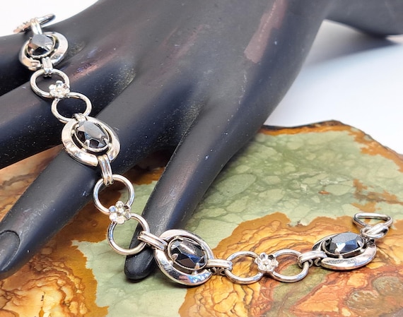 Dixelle Sterling Silver Rhodium Plated Bracelet With 4 Faceted Hematite Stones