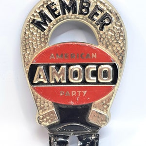 Vintage Amoco Oil Pressed Steel Tin Litho License Plate Topper "Member Amoco American Party"