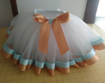 White tutu girls skirt with gold and light blue ribbon. Size 6 girls. Only one available. New. Handmade.