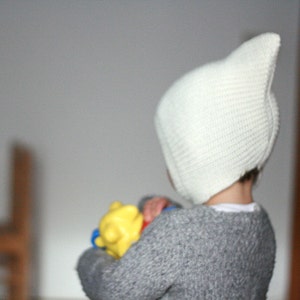 Baby Pixie knit bonnet in soft alpaca blend yarn, available in many colors