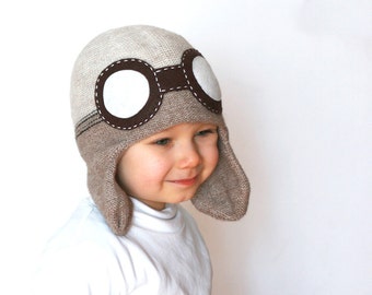 Kids aviator hat, knitted in wool alpaca blend in beige color, with the felt goggles, soft and warm