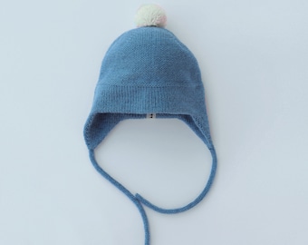 Baby wool knitted earflap hat in soft alpaca blend, available in many colors