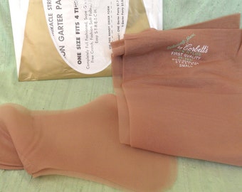 One pair of seam free nylon stockings / vintage, small, Corbett's