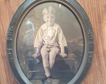 Antique oval picture frame w convex bubble glass / vintage boy picture with domed glass