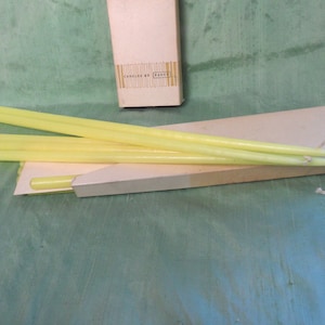 18" yellow candle lot / eleven vintage extra long Faroy taper candles