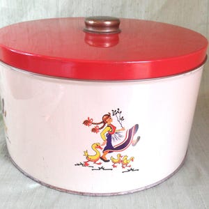 Large round tin / charming vintage red and beige with skipping girl and ducks