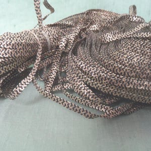 Skein of black and gold thin metallic trim / vintage braided yardage / 3/16&quot; wide / one hank