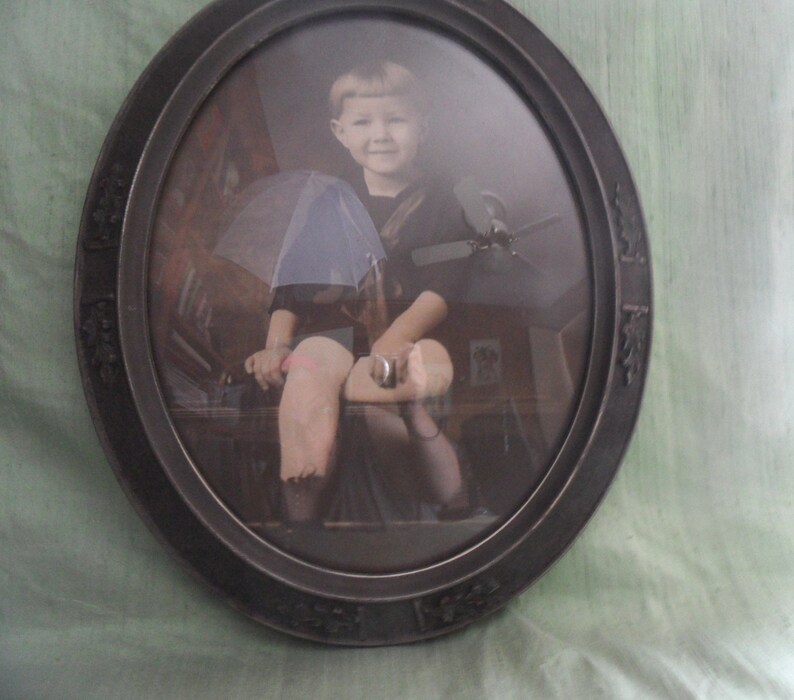 Decorated wood frame with convex bubble glass antique vintage toddler with domed glass boy picture