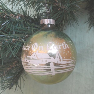 Shiny Brite stenciled PEACE ON EARTH glass tree ornament  / vintage pale green bauble
