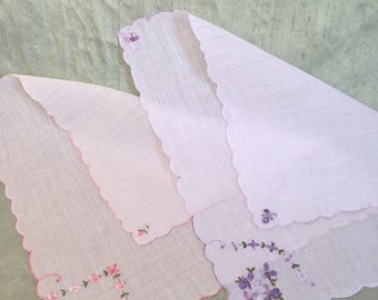 Two complementary embroidered floral hankies /  vintage purple and pink handkerchief pair