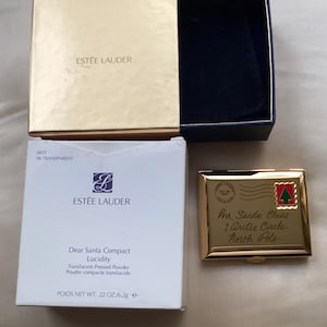Polvos compactos coleccionables de Estée Lauder, carta a Papá Noel, en perfecto estado y en caja.
