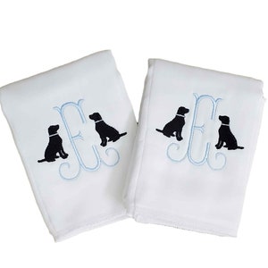 Cotton diaper burp cloth embroidered with a single initials framed with two dogs. Colors can be customized for a baby boy or girl.