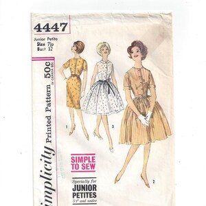 May include: Simplicity sewing pattern number 4447 for a junior petite dress. The pattern is for a dress with a button-up front and a skirt that falls to the knee. The pattern is simple to sew and is specifically for junior petites 5'1" and under.