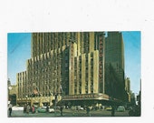 1964 Postcard of RCA Building Radio City Music Hall, Rockefeller Center, New York City, Posted with 4 Cent Stamp, Message, Old Cars