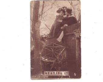 Antique, Early 1900s Humorous Postcard, Posted with 1 Cent Stamp, Black & White Photo of Couple's Escape Over Fence Vintage Postcard