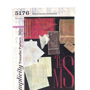 May include: A Simplicity embroidery transfer pattern with the number 5176 and the text "Embroidery Transfer" printed on the top. The pattern includes various designs for towels and other items, including the letters "R", "PBO", "NED", "AWG", and "T.G.S.M."