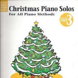 May include: A book cover with a Christmas tree illustration and the title "Christmas Piano Solos" in bold, black text. The subtitle is "For All Piano Methods" in black text. The book is for level three and is published by Hal Leonard.