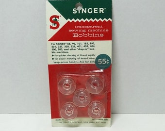5 Singer Sewing Machine Bobbins in Original Package, 13/16 Inches Wide, 1970 Transparent Drop In, Home Sewing Accessories, Fits Many Machine