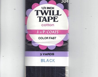May include: A package of black 1/2 inch twill tape, 3 yards long, made of cotton by J. & P. Coats. The tape is colorfast and is priced at 30 cents.