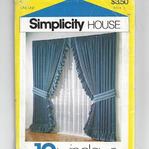 May include: A Simplicity House pattern for 10 windows, featuring blue curtains with ruffles and white trim. The pattern is labeled with the number 202 and the price $3.50.