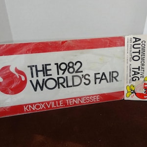 1982 World&#39;s Fair License Plate in Original Package, Knoxville, Tennessee, White Aluminum with Red, Exposition Souvenir Vintage Travel Event