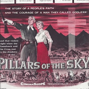 May include: A movie poster for the film "Pillars of the Sky" starring Jeff Chandler and Dorothy Malone. The poster features a dramatic scene with a man and woman standing in front of a sunset with a cross in the sky. The poster also includes the tagline "The story of a people's faith and the courage of a man they called Godless!"