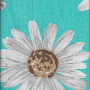 May include: A white daisy with a brown center on a turquoise background. The daisy has a textured appearance, as if it is printed on fabric.