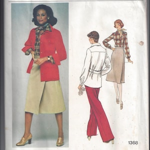 May include: A vintage sewing pattern for a red jacket and a beige skirt, and a white shirt with red pants. The pattern is by Calvin Klein and is for size 1368.