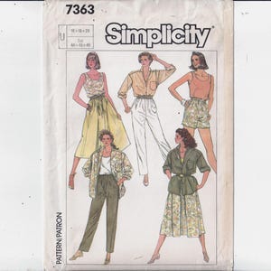 May include: Simplicity sewing pattern envelope featuring illustrations of various women's clothing styles. The designs include a skirt, pants, shorts, and tops. The envelope is labeled with the number 7363 and the Simplicity logo.