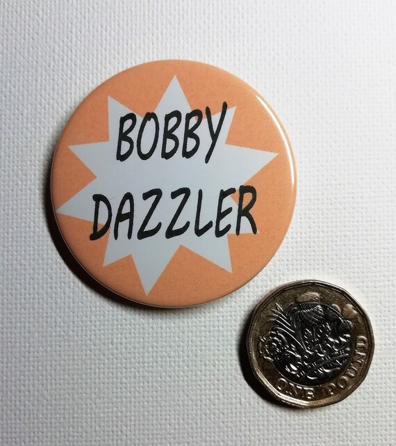 Bobby Dazzler badge or keyring star of the show bobbie dazler pin button gift