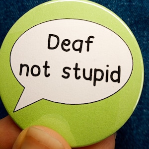 Deaf Not Stupid Pin Badge - Hearing Loss Awareness (45mm)