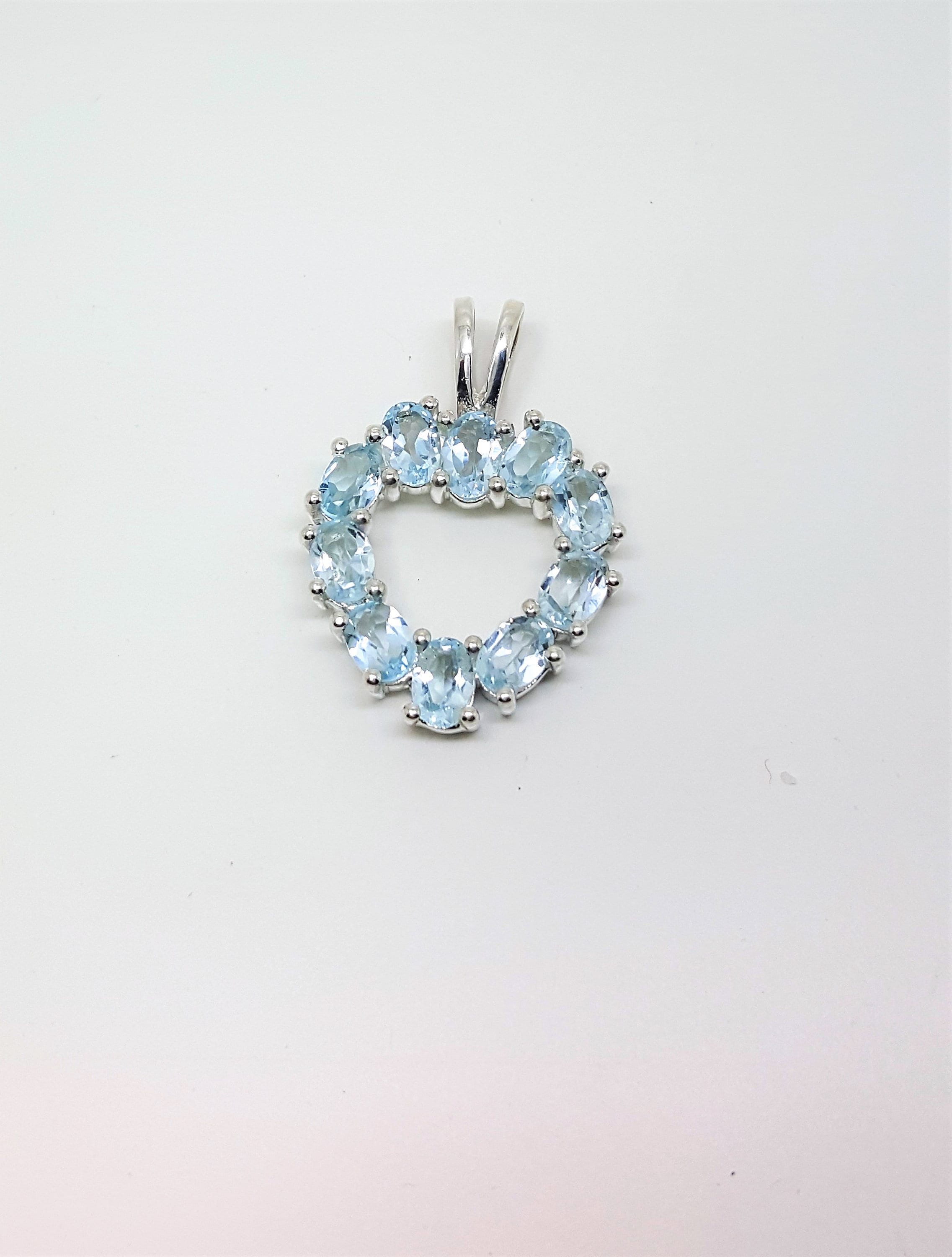 BTS-NP9610/BTP/CZWH/R Sterling Silver Pendant with Square Blue Topaz and Round White CZ 