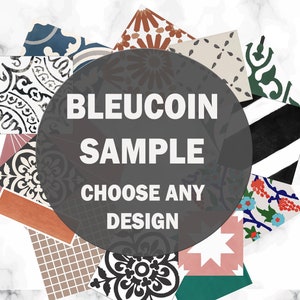 May include: A selection of patterned tile samples in diverse colours and designs, including floral and geometric patterns. The text "BLEUCOIN SAMPLE CHOOSE ANY DESIGN" is displayed in a dark grey circle, set against a white marble background.