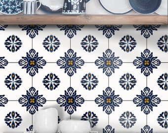 May include: A wall section covered in square tiles featuring a repeating pattern of dark blue, white, and yellow floral motifs. The tiles are arranged in a grid, creating a continuous design. The text "BleUcoin" is visible in the bottom left corner.