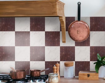 May include: A kitchen backsplash featuring a checkerboard pattern of white and dark brown marble tiles. The wall includes a copper pan hanging on a hook, a wooden range hood, and a white stove with copper pots. The text BleUcoin is visible.