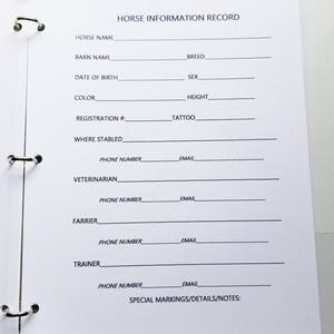 May include: A white horse information record form with blank lines for entering details such as horse name, breed, date of birth, sex, colour, height, registration number, tattoo, where stabled, phone number, email, veterinarian, farrier, trainer, and special markings/details/notes.