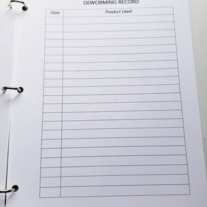 May include: A white binder with a black title "Deworming Record" and columns labelled "Date" and "Product Used".